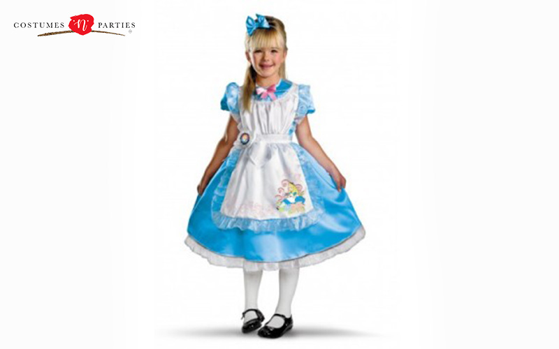Child in an Alice in Wonderland costume on white background.
